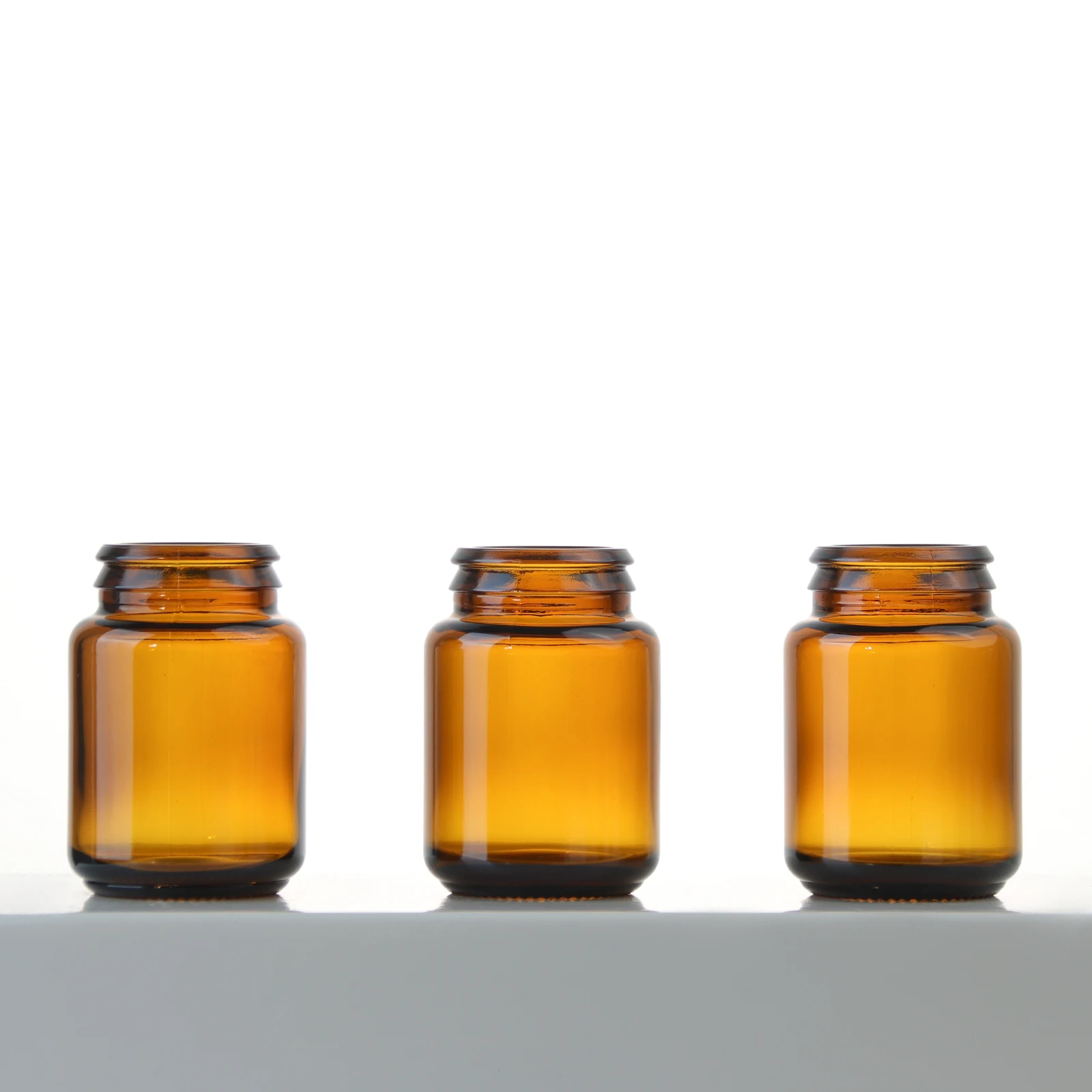 Wholesale 50ml glass pill bottle