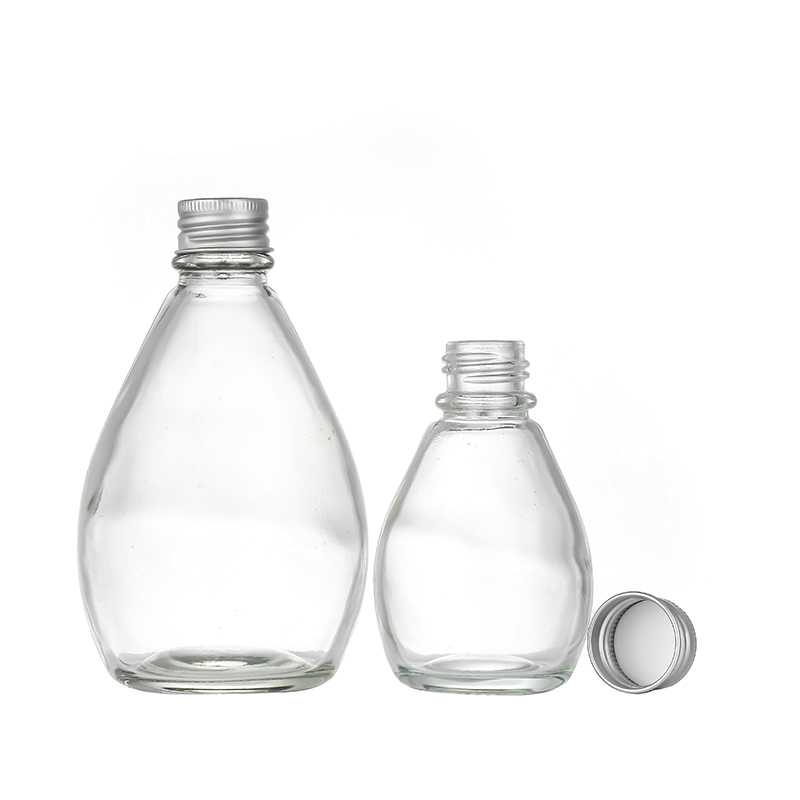 Factory wholesale Wholesale Clear Glass Spray Bottles - Water drop shape glass juice bottles wholesale Cui Can Glass detail pictures