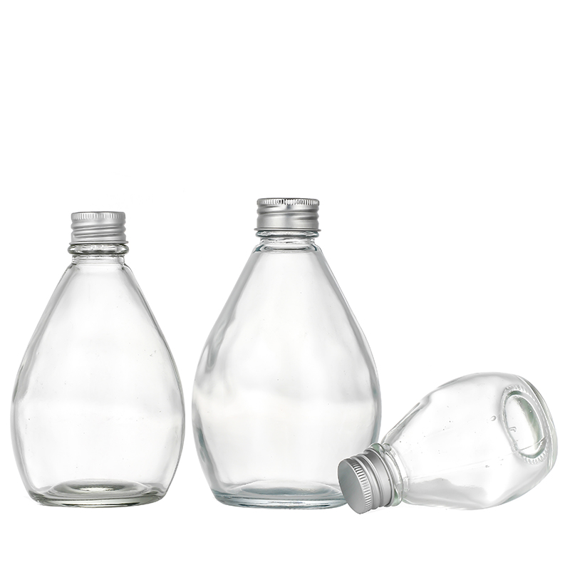 Factory wholesale Wholesale Clear Glass Spray Bottles - Water drop shape glass juice bottles wholesale Cui Can Glass detail pictures