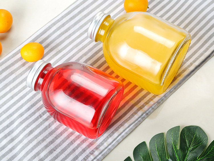 2022 High quality Diffuser Bottles Wholesale - Empty juice glass bottles wholesale Cui Can Glass detail pictures