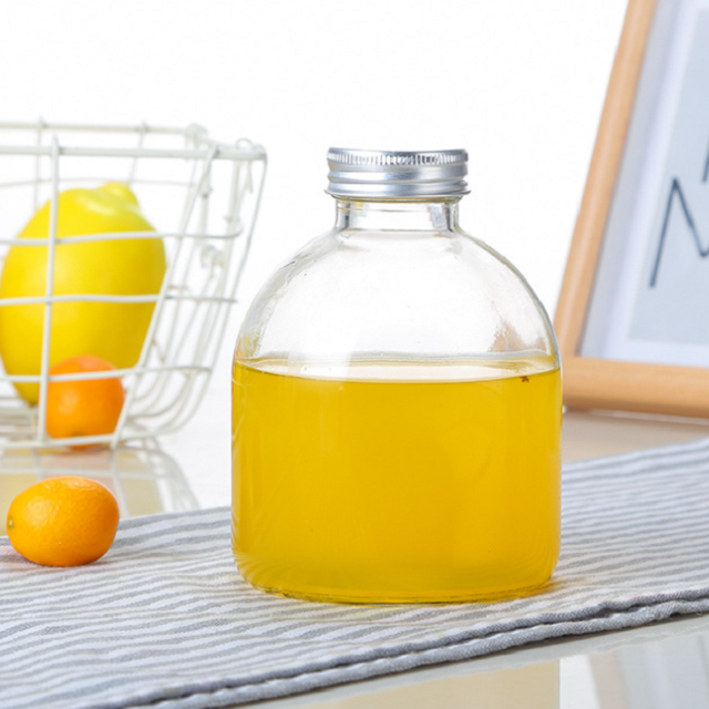 2022 High quality Diffuser Bottles Wholesale - Empty juice glass bottles wholesale Cui Can Glass detail pictures