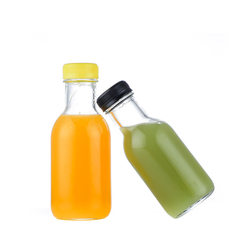 Empty clear round juice glass bottles wholesale