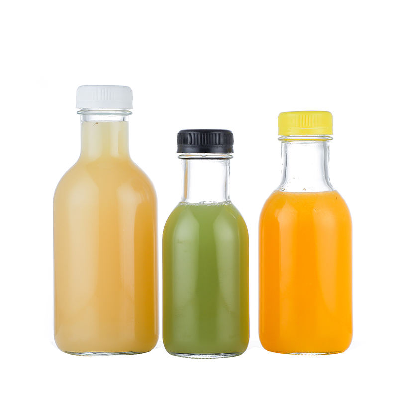 Empty clear round juice glass bottles wholesale