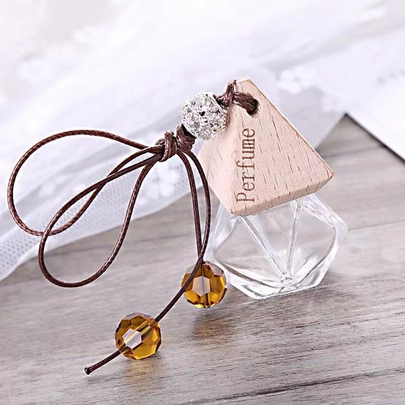 empty car diffuser bottles with wooden cap